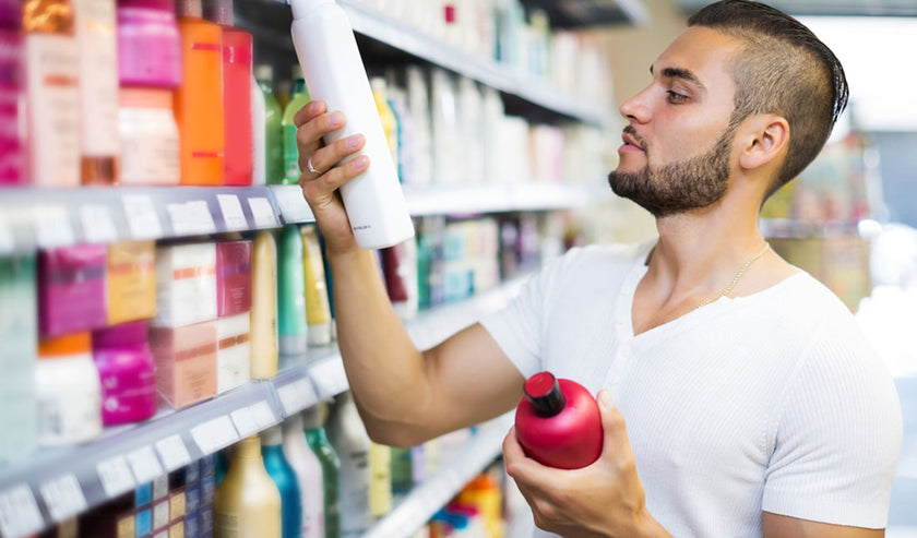 guy choosing shampoo guy choosing shampoo